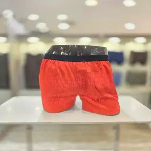 휠라언더웨어 60수 주자 워싱 데님 로고 나염 아웃밴드 남성 트렁크 FI253TK15M001 레드