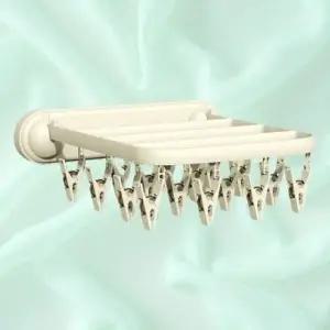 ( )여행용 접이식 언더웨어 벽부착 리빙 공간활용 옷걸이_24720841