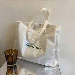 스타일하우스)여행가방 보스턴백 캐리어 여성 유광 비닐코팅 에코백