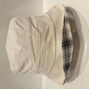 [롯데백화점]캡텐 남녀공용 엘르 로제리아 면 벙거지 ELF2UGC006