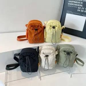 미니 사이즈 영문 나일론 스트링 남여공용 다용도 크로스백