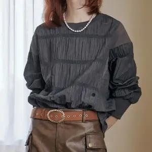 [마쟈] 버튼포인트 엠보 셔링 긴팔 블라우스 ZD10QT500NA