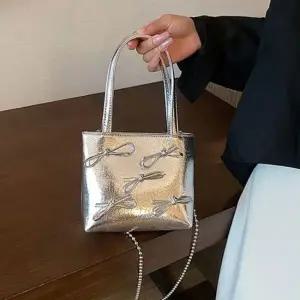 (스타일하우스)여행가방 보스턴백 캐리어 여성 리본포인트 실버