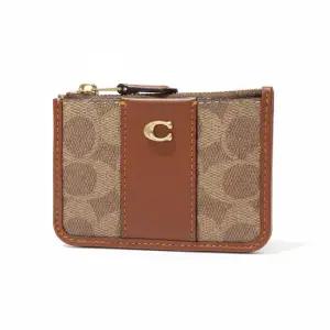 26SS 미니 스키니 아이디 케이스 인 시그니처 캔버스 CI185 B4 XHG)