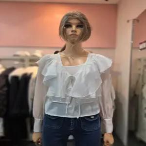 [에고이스트] 러플 디테일 리본 여밈 시스루 블라우스  ES1WB-762