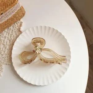 |CCA85FB|여성용 로맨틱 리본 큐빅 헤어 집게핀