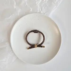 |CCA85F2|여성용 럭셔리 골드펄 트위스트 헤어타이 헤어밴드