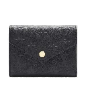 [중고명품] 블랙 카프스킨 앙프렝뜨 빅토린 플랩 여성 반지갑 M64060