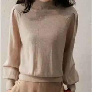 [옷은날개] 반목 터틀넥 퍼프 소매 니트티 니트 블라우스