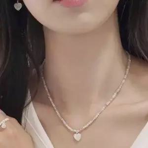 FN006 캣츠아이 합성석목걸이 (화이트) WFFRBQE