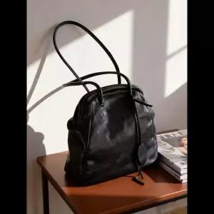 호환  블랙 가죽 핸드백 여성용 통근 토트백 2026 신상 명품 멀리스트 하이엔드 싱글 숄더 크로스백