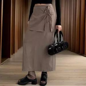 [신상오픈런]여성 리본 디테일 미니랩 H라인 롱스커트 (33138353)