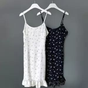 [신상오픈런]여성 스모크 프릴 미니 드레스 끈 조절 가능한 플라워 패턴 (38169403)