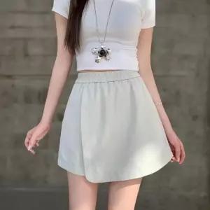 [신상오픈런]여성용 베이지 블랙 랩 스타일 밴딩 미니스커트 치마팬츠 (38633029)