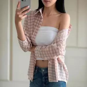 [신상오픈런]여성 루즈핏 언발란스 힙커버 시스루 여름 긴팔 체크 블라우스 (38642678)