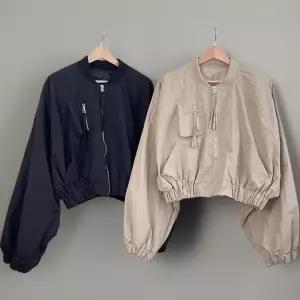 [신상오픈런]여자 힙한 가오리핏 셔링 나그랑 크롭 바람막이 점퍼 (40724325)