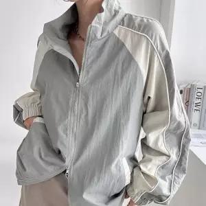 [신상오픈런]봄아노락 하이넥 투톤 여자 파이핑 나일론자켓 집업점퍼 (29988216)