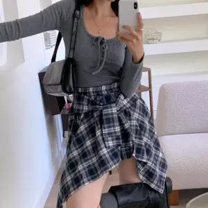 [신상오픈런]여자 셔츠치마 체크 플레어 매듭 키치 밴딩 미니스커트 (41115440)