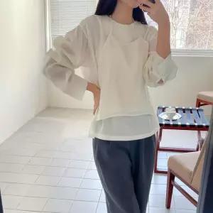 [신상오픈런]홀터뷔스티에 레이어드 리본끈 라운드넥 시스루블라우스 (30553237)