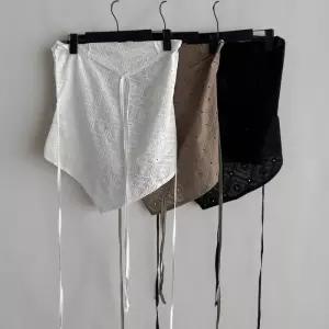 [신상오픈런]여성 홀터넥 펀칭 보헤미안 스트랩 언발란스 휴양지 나시 (37001272)