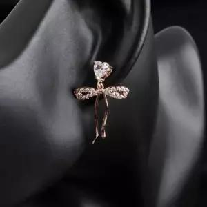 [다잇템]여자 투컬러 크리스탈 큐빅 리본매듭 귀걸이 (23461202A)