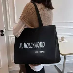레터링 블랙 숄더백 큰가방 여행보조 직장인 캐주얼 여성패딩숄더백 캔버스백 여성버킷백