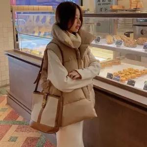 여성 겨울아우터 사선 조끼패딩 오버핏 패딩 베스트 pzr2+2XOl