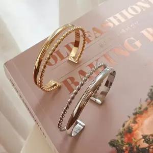 [다잇템]여자 두꺼운 커브드 골져스 트위스트 실버 팔찌 (23536488A)