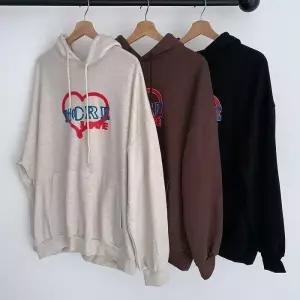 [다잇템]여자 후디 박스핏 FW 나염 하트 주머니 티셔츠 (41218179A)