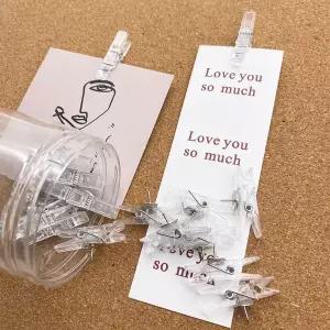 [에이치플러스몰]투명 압정 집게 클립 게시판 사진 걸이 20개 업소용집게 스텐접시