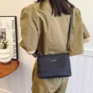 [신상오픈런]여성 스트리트 스타일 블랙 조절 끈 크로스 미니백 (39633252)