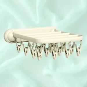 ( )여행용 접이식 언더웨어 벽부착 리빙 공간활용 옷걸이_24720841