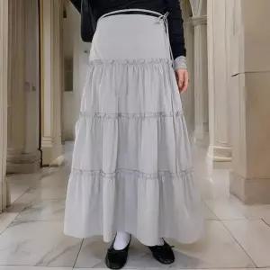 [다잇템]여성 롱 티어드 허리스트랩 여유핏 스커트 (31623624A)