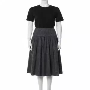 미쏘 체크 롱 스커트_MIWWHG446G 624573