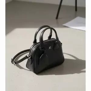 쿠레주 COURREGES AC 스터드 레더 미니 볼링백 블랙 324GSA132CR0065