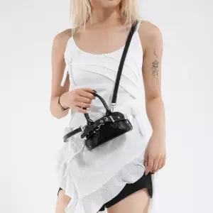 원더맨 펄 가방 슬림핏 데일리룩 미니백 자개 숄더백 여성 KUK3