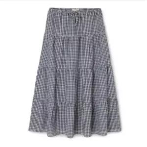[백화점 홈쇼핑 정품] 후아유 여성 체크 롱 티어드 스커트 (WHWHG2441F)