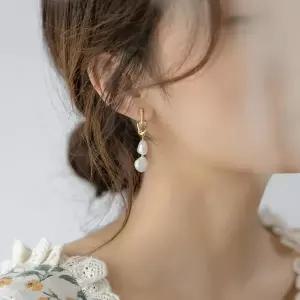 ( )귀걸이 담수진주 써지컬 자연주의 두알 매듭 심플