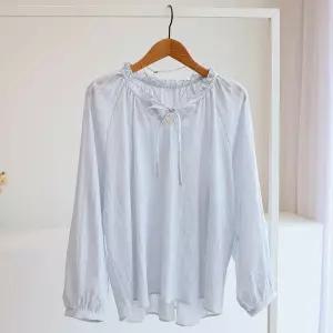 [잇수다] 벨리트 리본 프릴 시스루 루즈핏 퍼프 소매 블라우스