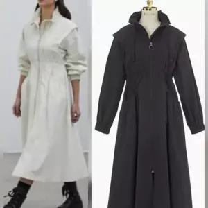 [에고이스트]셔링 포인트 하이넥 롱 플레어 점퍼 (EQ1WC261)_DG