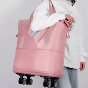 확장형 여행 캐리어 대용량으로 수납력이 좋고 바퀴가 달려 있어 이동이 편리한 이사   이민가방