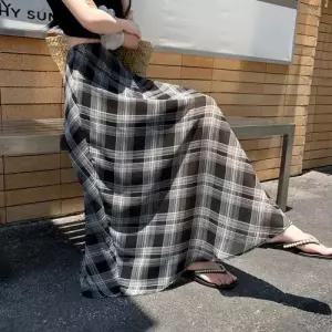 마르소 치마 롱 캐주얼 언밸런스 바캉스룩 여성쉬폰스커트 쉬폰 체크 A라인 UNO1