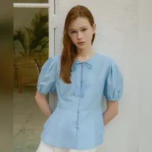 [롯데백화점]올리브데올리브 볼륨 소매 페플럼 체크 블라우스 OW5MB417