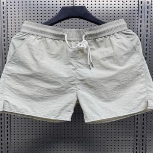 여름 얇은 얼음 실크 빠른 건조 캐주얼 루즈 반바지 남성용 비치 바지 퓨어 컬러 3/4 길이 바지 청소년 활동복