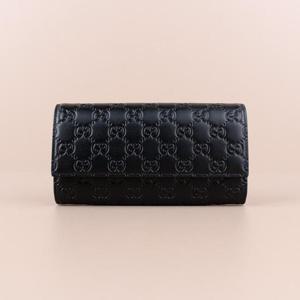 구찌 시그니처 플랩 여성 장지갑 블랙 779785 CWC1G 1000