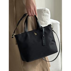 헤지스 액세서리 26SS 나일론백1위인기급상승SAVER 품절대란 블랙 나일론 퍼피 로고 나일론 토트 겸 숄 HIBA6E920BK