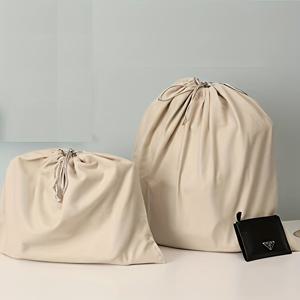 TEMU 세 가지 사이즈로 제공되는 고급스러운 방진 드로스트링 수납 가방. 소재는 부드럽고 가방을 손상시키지 않습니다. 결혼식에서 웨딩 드레스를 보관하는 데 완벽합니다.