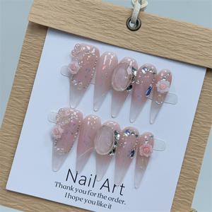 TEMU 솔리드 컬러와 반짝이는 장미 디자인의 독점적인 핸드메이드 네일 아트. 순수하고 우아한 미적 감각을 담아내며, 탈착 가능한 젤 네일로 세련된 룩을 연출할 수 있습니다.