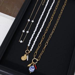 TEMU 세라믹 튤립 및 스테인리스 스틸 호록 펜던트, 모조 진주 비즈 초커, 14K 금도금 스테인리스 스틸 체인으로 구성된 여성용 트렌디 펜던트 목걸이 3종 세트. 파티, 휴가 및 일상적인 주얼리 추가에 적합합니다.