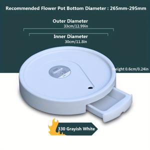 TEMU 5가지 사이즈로 제공되는 이 원형 화분 트레이는 물방울 디자인, 숨겨진 이동식 트레이 및 고무 바퀴가 특징이며, 서랍형 물 수집 트레이도 함께 제공됩니다.